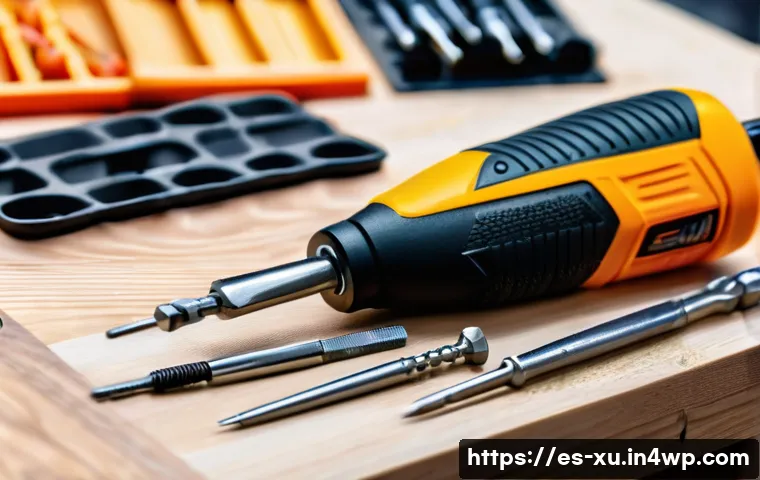 DIY 제작을 위한 필수 도구 목록 - A detailed close-up of an ergonomic screwdriver set with interchangeable tips, featuring handles mad...